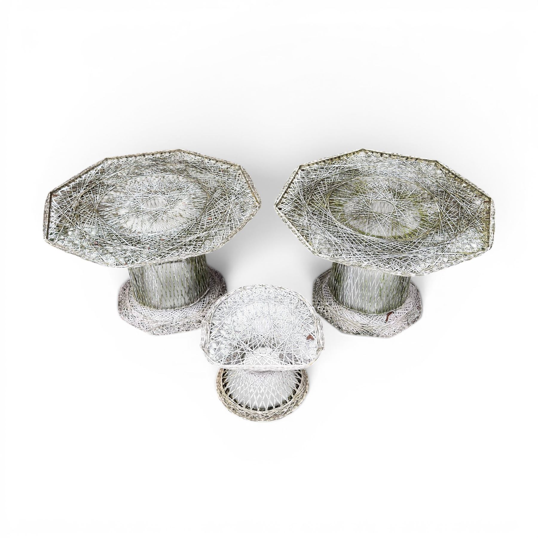 Two French early 20th century painted wicker octagonal garden tables, circular pedestals with parasol opening; with matching side table (3)