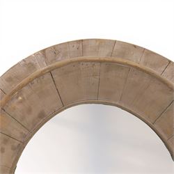 Rusticated driftwood wall mirror, of oval form, the mirror plate within a panelled driftwood frame, overall H83cm W70cm
