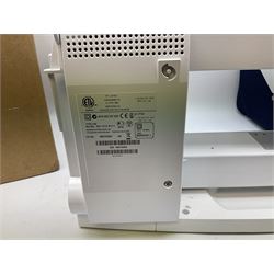 Bernina 'Artista' 630 computerised sewing machine with stitch regulator, carrying case, instruction booklet and accessories, in original box