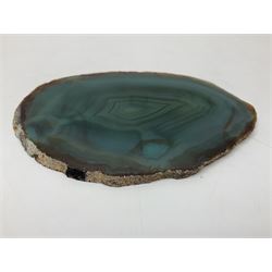 Pair of green agate slices, polished with rough edges raised upon silvered metal stands, H19cm