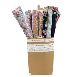 Haberdashery Shop Stock: Various rolls of chintz and patterned rolls of fabric including a towelled chintz fabric and others, mostly synthetic (qty) in one box