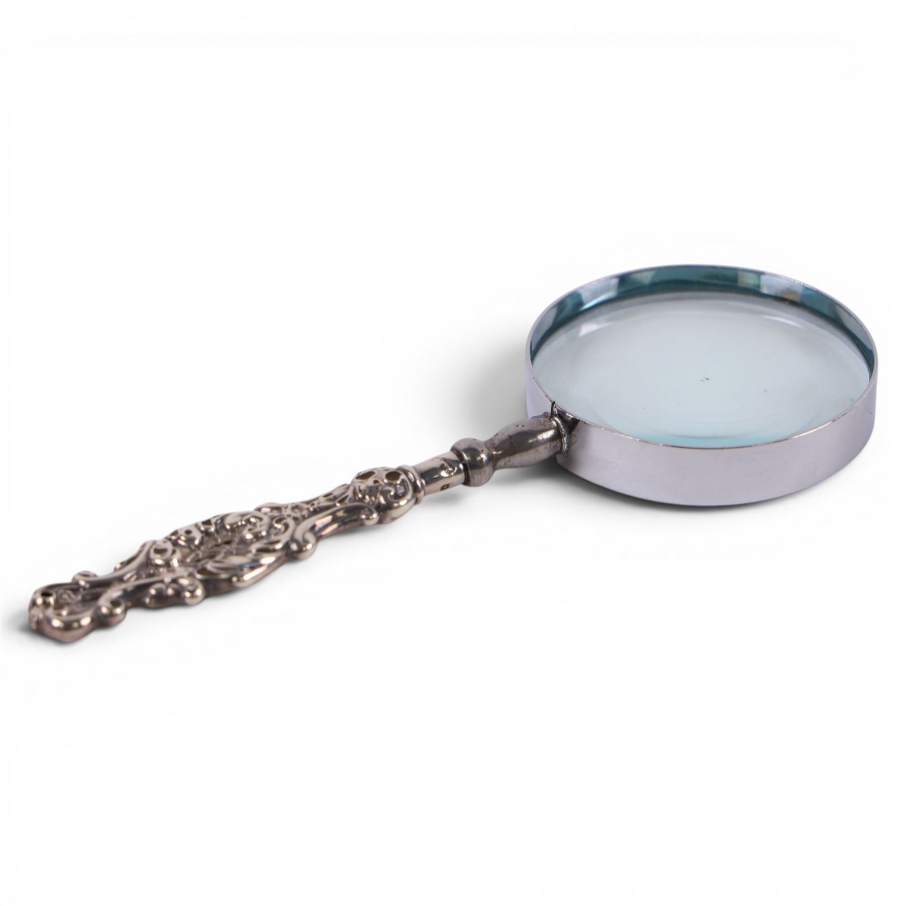 Silver compact mirror, silver handled magnifying glass and a silver-gilt bangle, all hallmarked