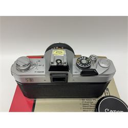 Canon FTb camera body, serial no. 715838, with 'Canon FD 50mm 1:1.8' lens, serial no. 207888, in original box, together with Canon FTb camera body, serial no. 557817, with 'Canon FD 35mm 1:3.5 S.C' lens, serial no. 126210 and Canon EX Auto camera body, serial no. 296244 with 'Canon EX 50mm 1:1.8' lens, serial no. 380869  