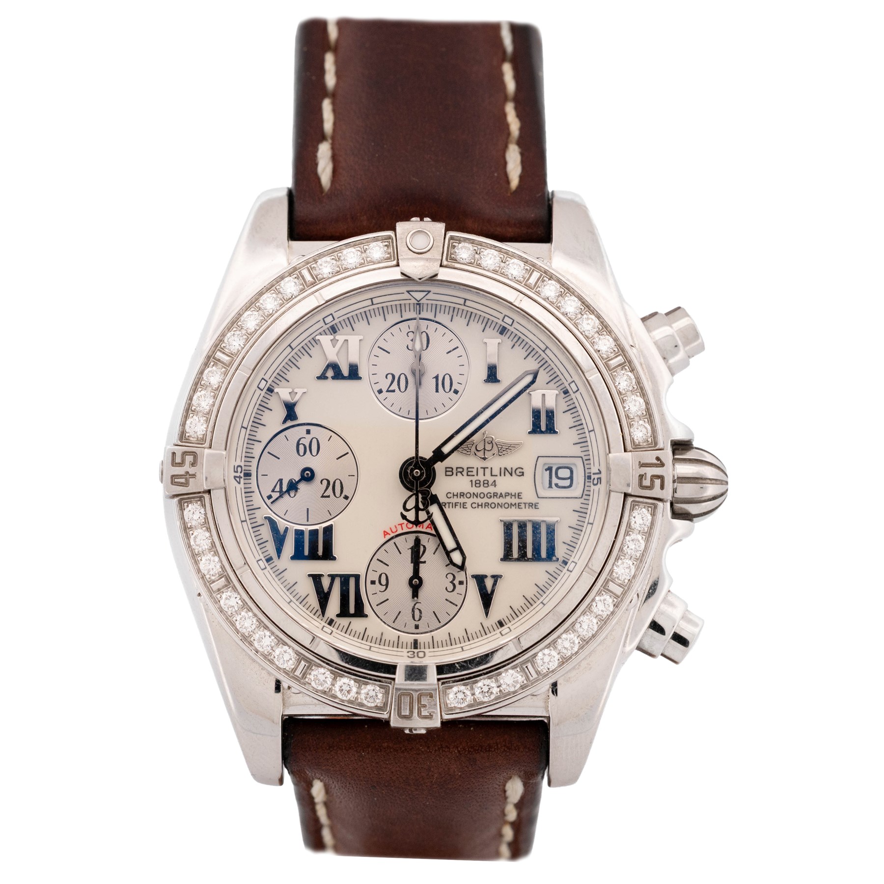 Breitling Chrono Cockpit gentleman's stainless steel diamond set automatic wristwatch, Ref. A13357, serial No. 2084732, cream dial with Roman numeral hour markers and date aperture, diamond set unidirectional rotating bezel, on Breitling brown leather strap, with fold-over clasp