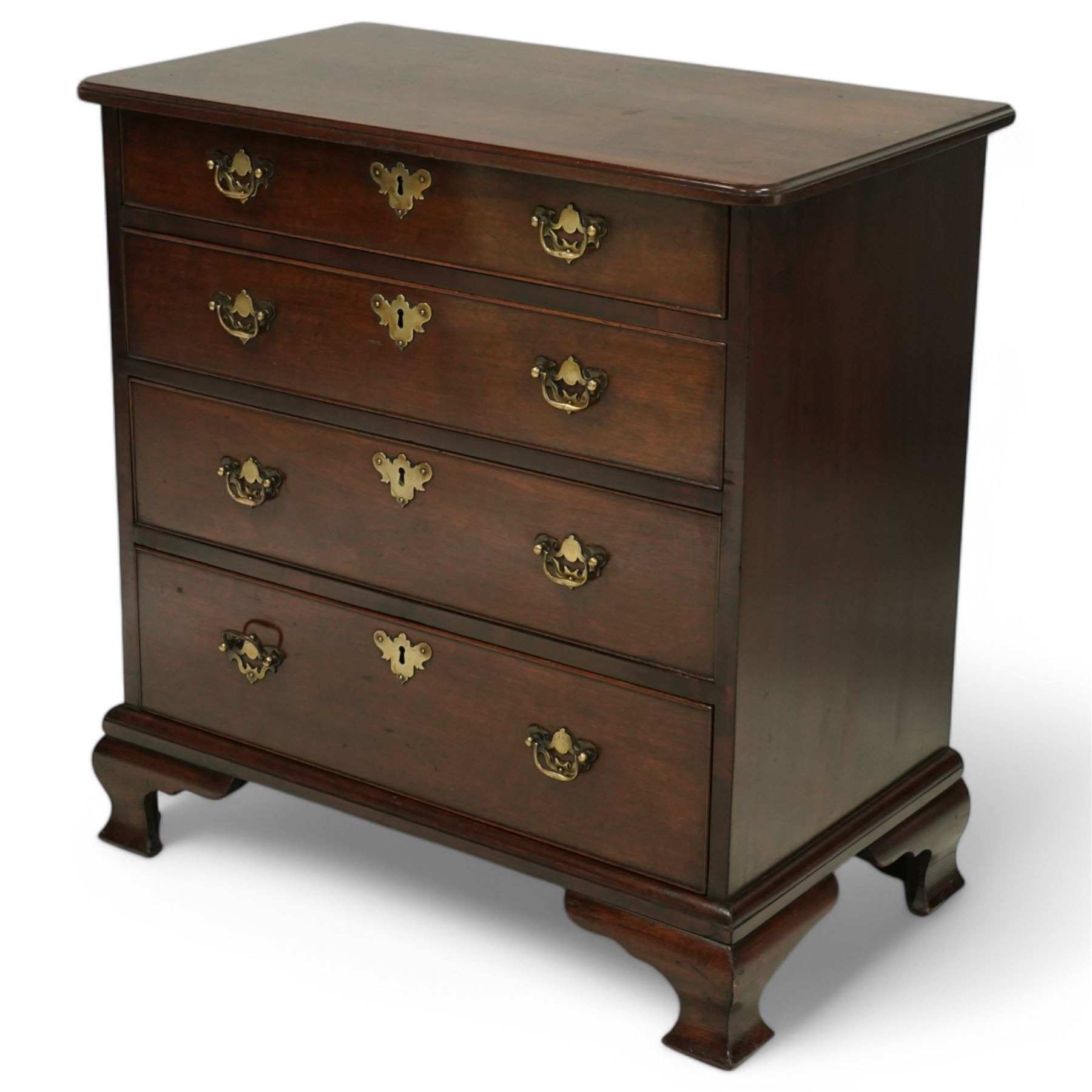 Small Georgian mahogany chest of drawers with four long graduated drawers with swan neck handles on ogee feet