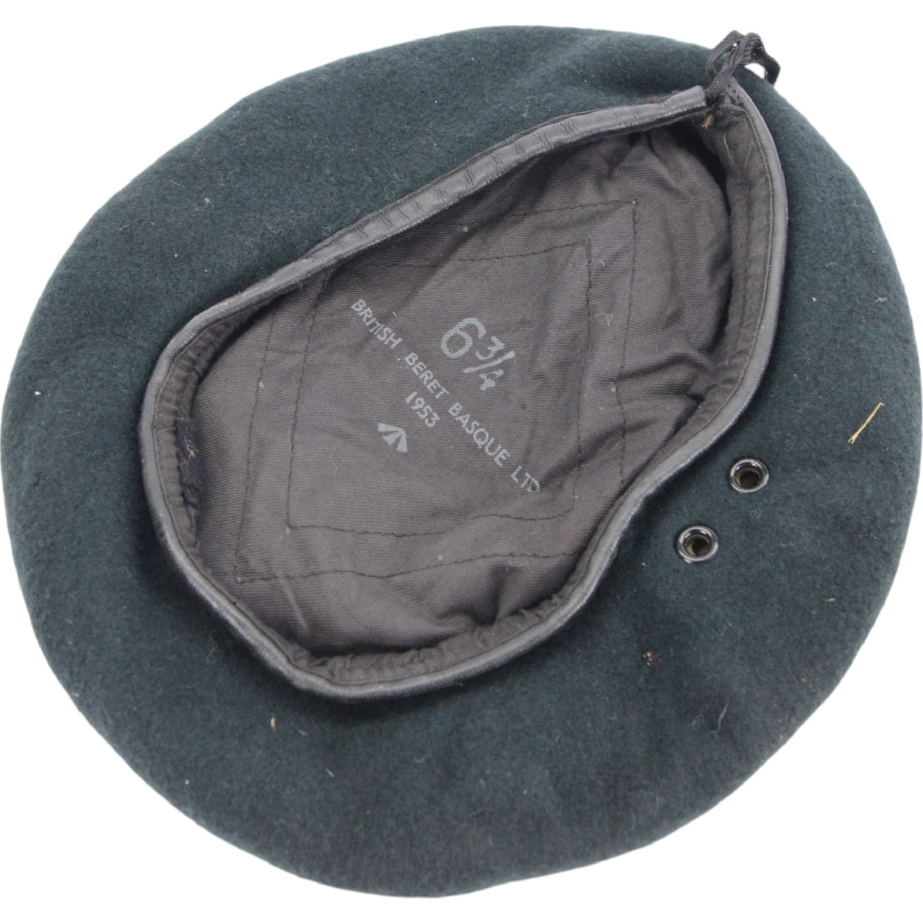 Two British Berets, fine green wool cloth with leather trim, cloth lining having makers details of “BRITISH BERET BASQUE LTD”, one with The Green Howards cap badge, together with other Green Howards buttons and badges, webbing bags and other military items
