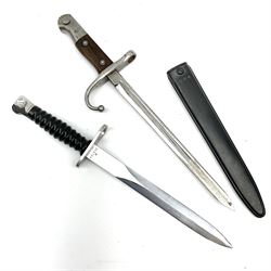Swiss M1957 S.1.G. assault rifle bayonet, the 24cm double edged blade marked 'F over +W' for Waffenfabrik Bern and W343723, ribbed black grip and plastic scabbard L38cm; and cut down WW1 Turkish Mauser 1890/1903 pattern sword bayonet with numerous Ottoman Turkish Army marks, blade 26.5cm (Pommel has Ottoman Sultan's seal 'Tughra' - the same as on the Gallipoli Star awarded to Turks after the Gallipoli Campaign)