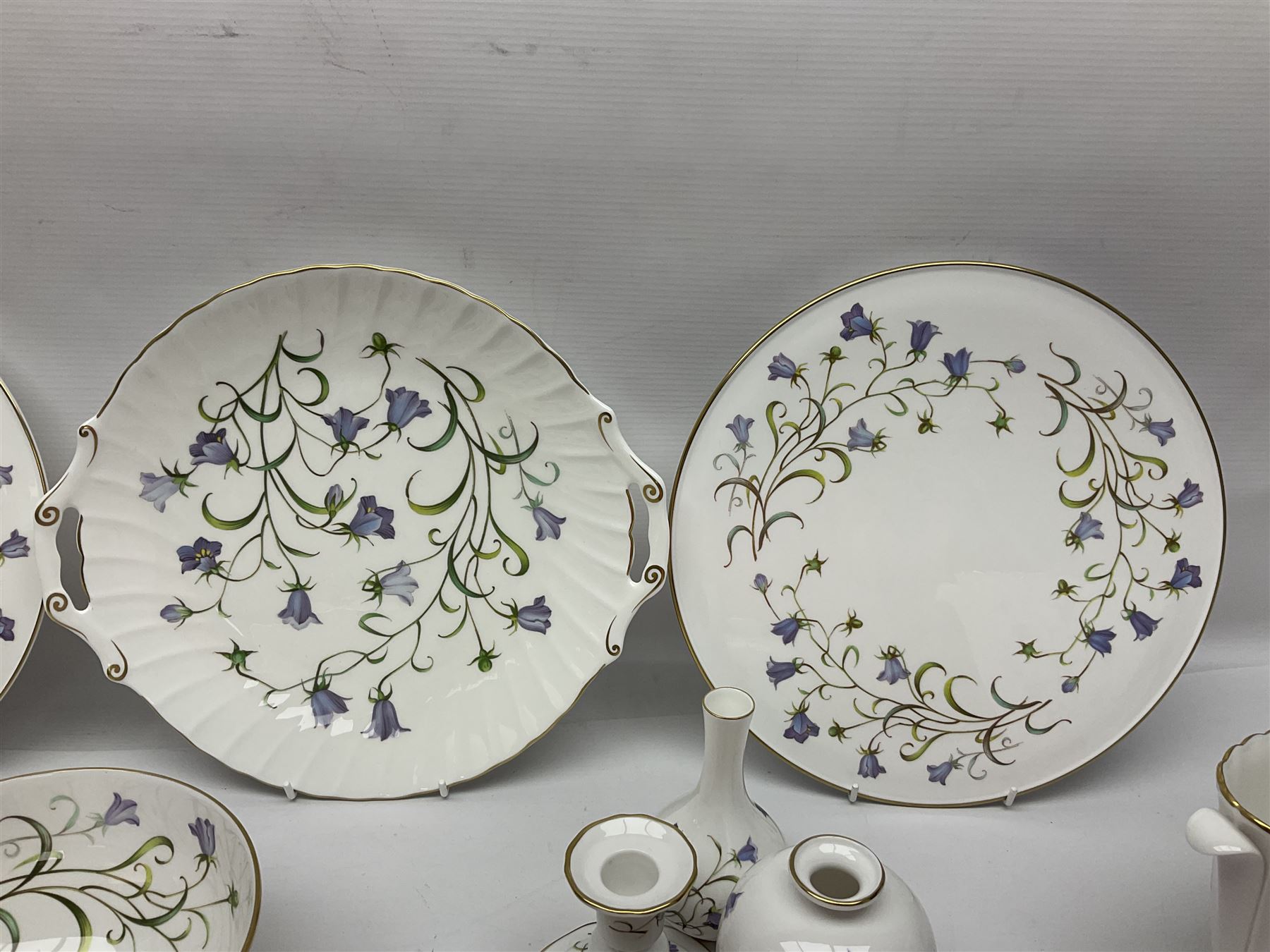 Large collection of Spode Campanula pattern ceramics, to include two cake plates, candle stick, vases bowls, planter, covered bon bon dish etc, many with boxes 