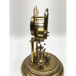 A German torsion pendulum clock by  Jahresuhrenfabrik (August Schatz & Söhne), Triberg, Germany, early 20th century with a 2-3/4-inch cream enamel dial within a spun bezel, upright Arabic numerals with minute track and steel spade hands, 400-day spring driven movement with a four-ball rotary pendulum, clear glass dome on a  20cm circular brass effect base.
Height 32cm 
