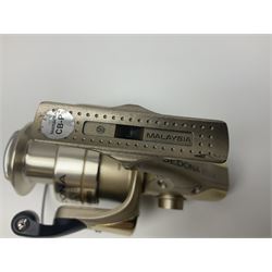 Four fixed spool reels, all in original boxes, comprising Shimano Ultegra 5500 XSD, with spare spool, Mitchell Autosurf 700, with spare spool, Shimano Sedona 600 FB with spare spool and D.A.M Quick 5001