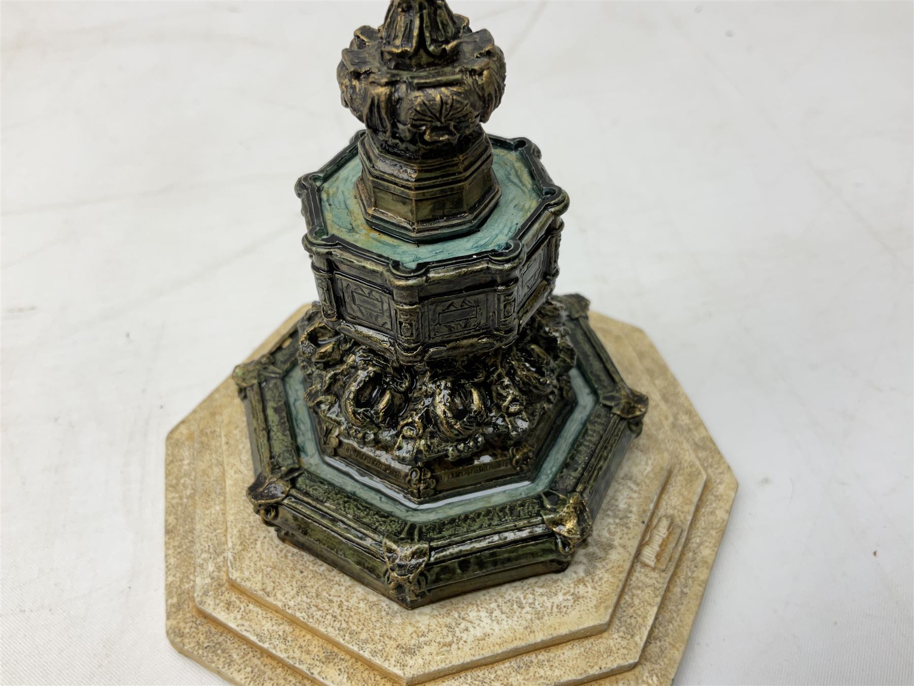 Five Lilliput Lane models from the 'Britain's Heritage' collection, comprising The Royal Albert Hall, Windsor Castle Round Tower, Eros and Nelson's Column and another snowed, all boxed