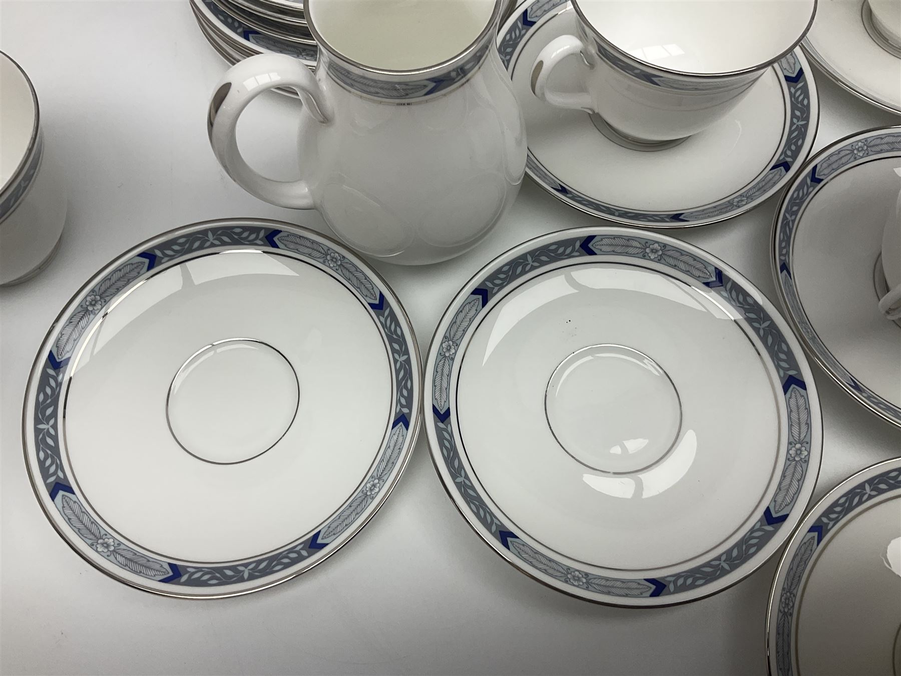 Royal Worcester Beaufort tea service, comprising teapot, milk jug, open saucier, eleven teacups, twelve saucers, eight dessert plates and one cake plate