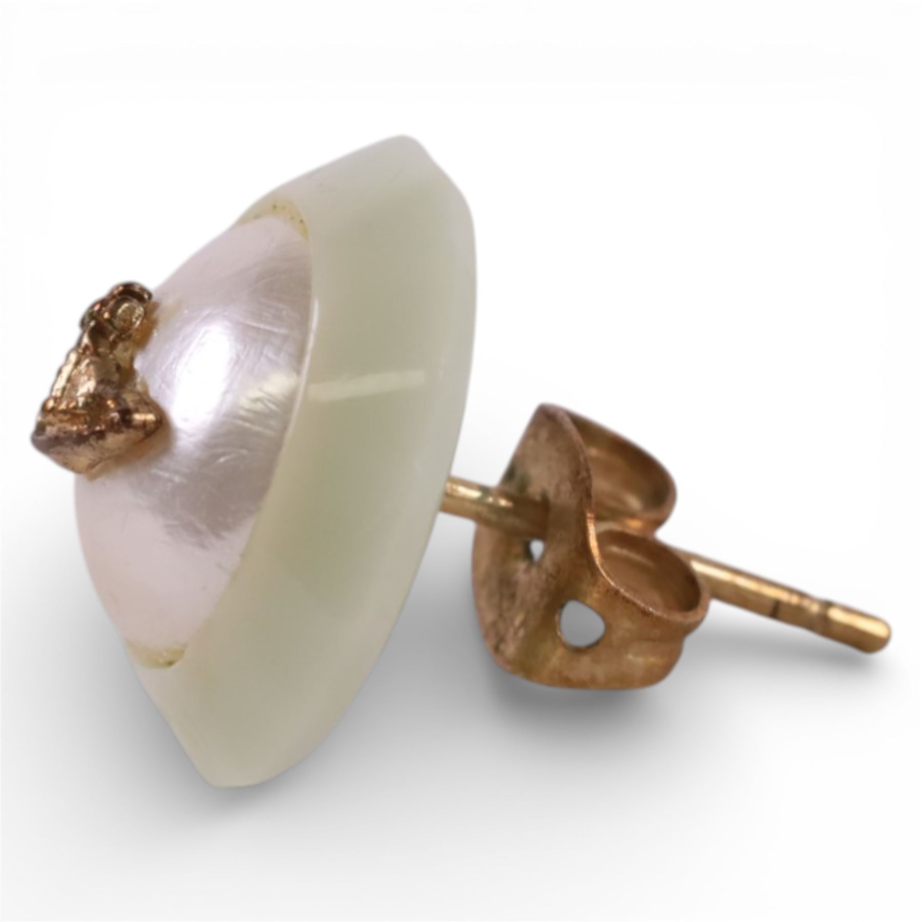 Pair of Vivienne Westwood stud earrings, with pouch