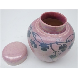  Ruskin pink lustre ginger jar and cover trailing vine leaf and grape decoration dated 1911 with painted scissor mark, H14cm  