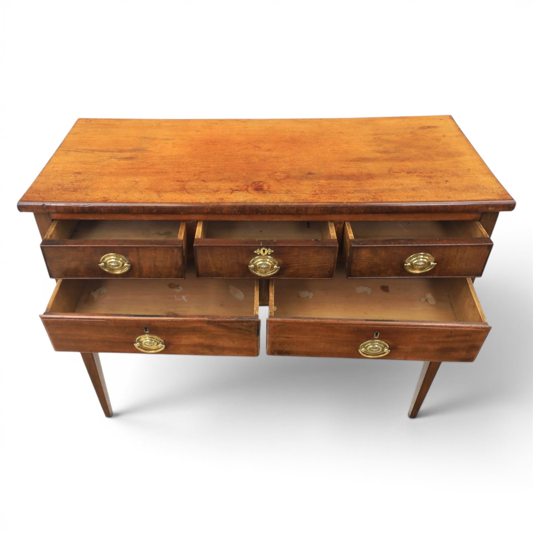 Georgian mahogany side table fitted with drawers, rectangular top over five drawers with brass handles, raised on tapering square supports