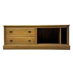 Contemporary oak television media cabinet, rectangular top with moulded edge, fitted with two long drawers beside two open compartments, on plinth base