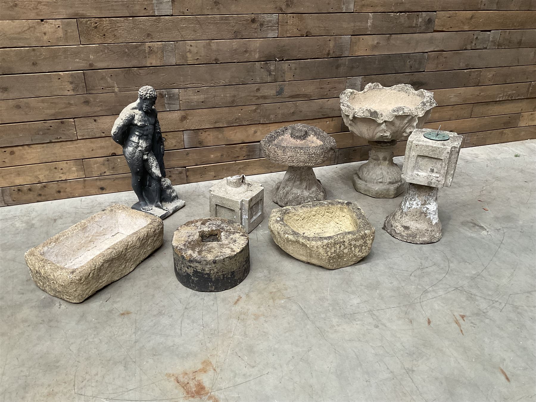 Collection of 9 decorative stone garden objects including sun dial small troughs mill stone and more,