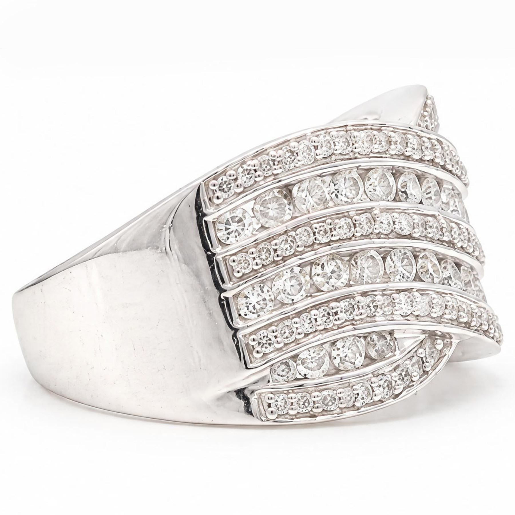 18ct white gold diamond wave design ring, channel and grain set with alternating rows of round brilliant cut diamonds, hallmarked, total diamond weight 1.00 carat