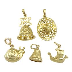 Five gold charms including snail, sombrero, ship and two bells, all stamped or hallmarked 9ct 