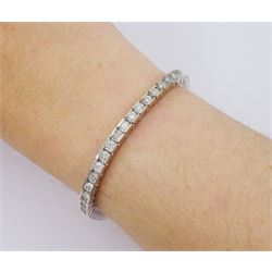 White gold round brilliant cut diamond line bracelet, stamped 14K, total diamond weight approx 4.85 carat