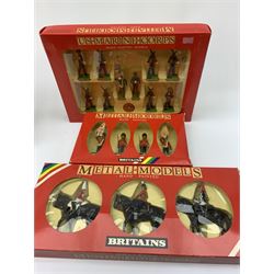 Britains 'Metal-Models' series - nine sets/mounted soldiers comprising 7218 H.M. Queen Elizabeth set, 7233 H.M. Queen Elizabeth set, 7305 U.S. Marine Corps set, 7205 Three Mounted Life Guards, 7201 Royal Marine Colour Party, 7203 Royal Marine Drum & Bugle, 7249 Queens Colour Party, 7246 Lifeguard Standard Bearer and 7234 Royal Canadian Mounted Police; all boxed (9)