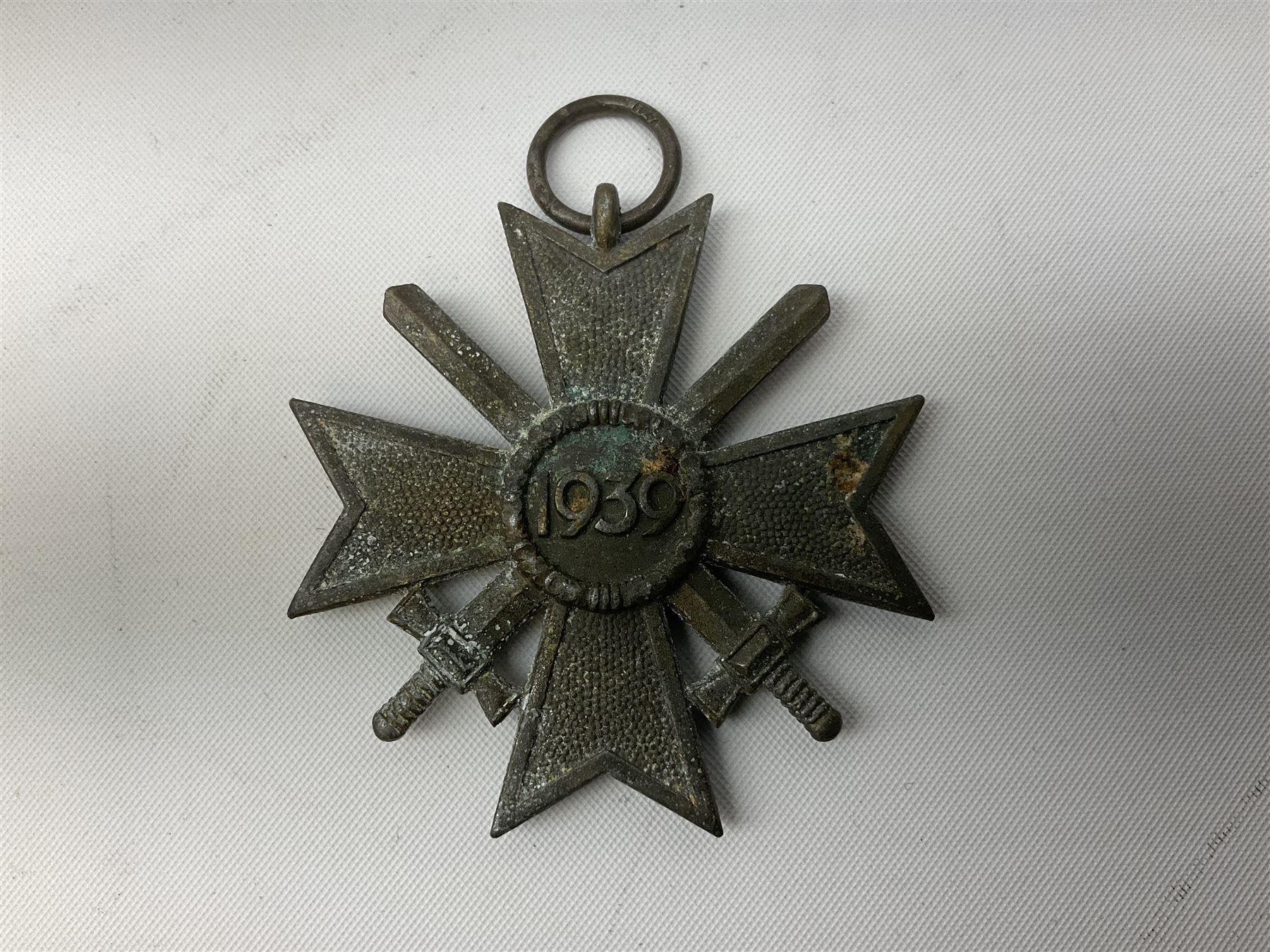 WW2 German Eastern Front Medal awarded to those who served on the German Eastern/Russian Front during the Winter Campaign period of 15th November 1941 to 15th April 1942 with original ribbon; and German War Merit Cross with swords 2nd Class (2)