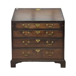 Georgian oak bureau, fall front enclosing fitted interior, four long graduating drawers, on bracket feet