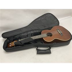 Brunswick Ukulele in a soft case with a earlier 20th century Banjo Ukulele in a lined and fitted case
