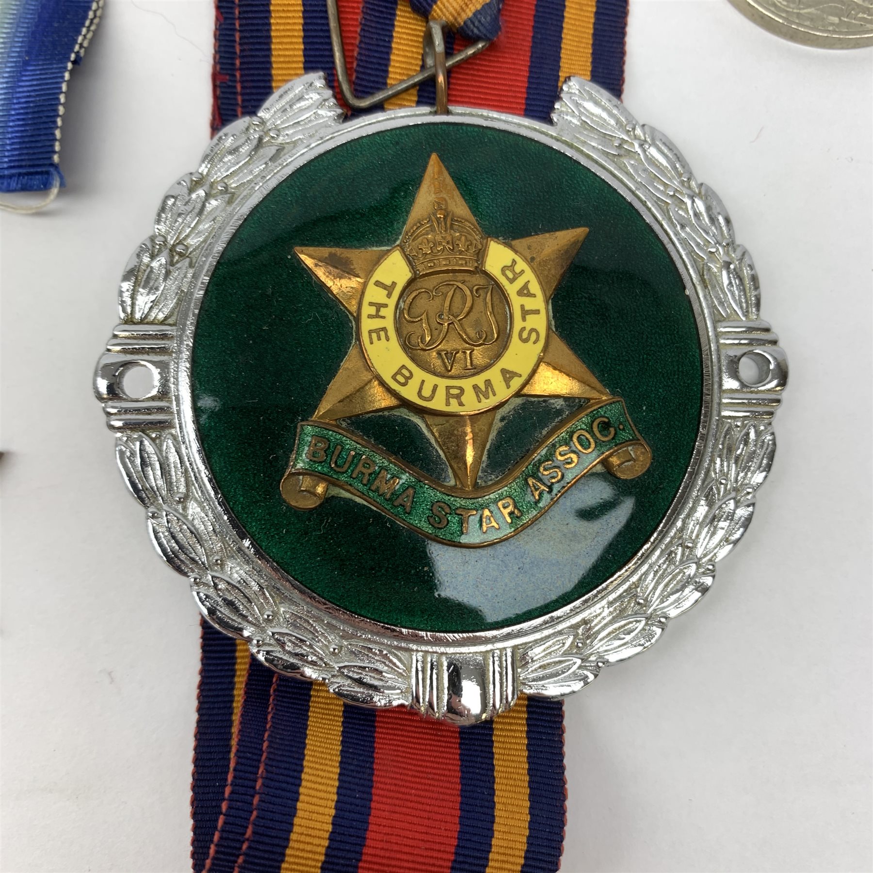  A group of WWII medals, comprising Pacific Star, Africa Star, Atlantic Star, Italy Star and The 1939-1945 Star, together with a War Medal 1939-1945, and Burma Star Association car badge.  
