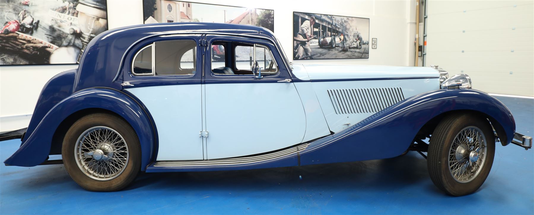 1939 MG SA Saloon

Registration: GRB 988
Chassis number: SA2983
Engine number: QPHG3242 (original engine)
Engine: 2,322cc six-cylinder petrol
Transmission: Manual
Odometer reading: 71,873 miles
Seating: Five
Colour: Two-tone blue
Former keepers: 6/7 recorded
V5C: Present
Keys: One

A 1939 MG SA Saloon, finished in an attractive two-tone blue colour scheme and retaining its original UK registration, GRB 988.

Introduced in 1936, the MG SA was the marque's prestigious sporting saloon, combining elegant coachwork with refined six-cylinder performance and luxurious accommodation. This example retains its original 2,322cc engine, numbered QPHG3242, and displays 71,873 miles on the odometer, although this mileage has not been independently verified.

The car is understood to have undergone an extensive rebuild and restoration between 2010 and 2015 and is today presented in showroom condition throughout. The coachwork has an excellent finish, complemented by outstanding chrome brightwork, wire wheels, a rear-mounted spare wheel, folding rear luggage rack and a desirable folding canvas sunroof. The engine bay is immaculately detailed, while the underside, chassis and suspension all reflect the high standard of restoration undertaken. A stainless-steel exhaust system has also been fitted.

The luxurious cabin features beautifully finished inlaid wood veneer, leather seating and period instrumentation, all presenting to an exceptionally high standard.

A particularly appealing aspect of this MG SA is its documented participation in the 1952 Daily Express National Motor Rally. Accompanying the vehicle are the original official rally programme together with period photographs showing the car competing in the event displaying entrant number 36. The programme lists entrant No. 36 in Class D.2 as an MG 2322cc, providing excellent documented provenance linking this car to one of Britain's best-known post-war motoring events, held between 12th and 15th November 1952.

Combining documented provenance with exceptional cosmetic presentation, this MG SA represents a rare opportunity to acquire one of MG's flagship pre-war sporting saloons.

At the time of cataloguing the vehicle started and ran well.

Features

• Original 2,322cc six-cylinder engine
• Manual transmission
• Original UK registration
• Two-tone blue coachwork
• Folding canvas sunroof
• Leather interior
• Inlaid wood veneer dashboard and trim
• Wire wheels
• Rear-mounted spare wheel
• Folding rear luggage rack
• Twin carburettors
• Stainless-steel exhaust system
• Extensive rebuild and restoration completed between 2010 and 2015

History and Documentation

• Approximately six to seven former keepers recorded
• Original engine (No. QPHG3242)
• Chassis No. SA2983
• Original UK registration
• Extensive rebuild and restoration completed between 2010 and 2015
• Original 1952 Daily Express National Motor Rally programme
• Period photographs showing the vehicle competing as Entrant No. 36
• V5C registration document not present
• One key

Condition

Presented in exceptional showroom condition, this MG SA has clearly benefited from a high-quality restoration completed to an impressive standard. The paintwork, chrome, interior, engine compartment and underside are all exceptionally well presented, reflecting the considerable work undertaken.

The vehicle started and ran well at the time of cataloguing. It has not been subjected to a full mechanical inspection by the auctioneers, and prospective purchasers should satisfy themselves as to the vehicle's condition, originality, mileage, specification and roadworthiness prior to bidding.

This vehicle forms part of the Estate of the late John Sills and is offered for sale by the Executors, providing a genuine reason for sale.