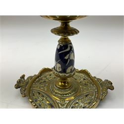 Victorian desk set, comprising an ink stand of square form with pierced and moulded decoration, inset with blue and white ceramic inkwell decorated with blossoming branches, together with a matching pair of brass mounted candlesticks, inkwell W15cm L15cm H13cm