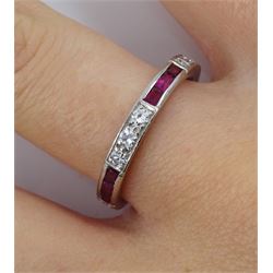 Platinum ruby and diamond full eternity ring, consisting of eight sections of  calibre cut rubies and round cut diamonds in a channel setting