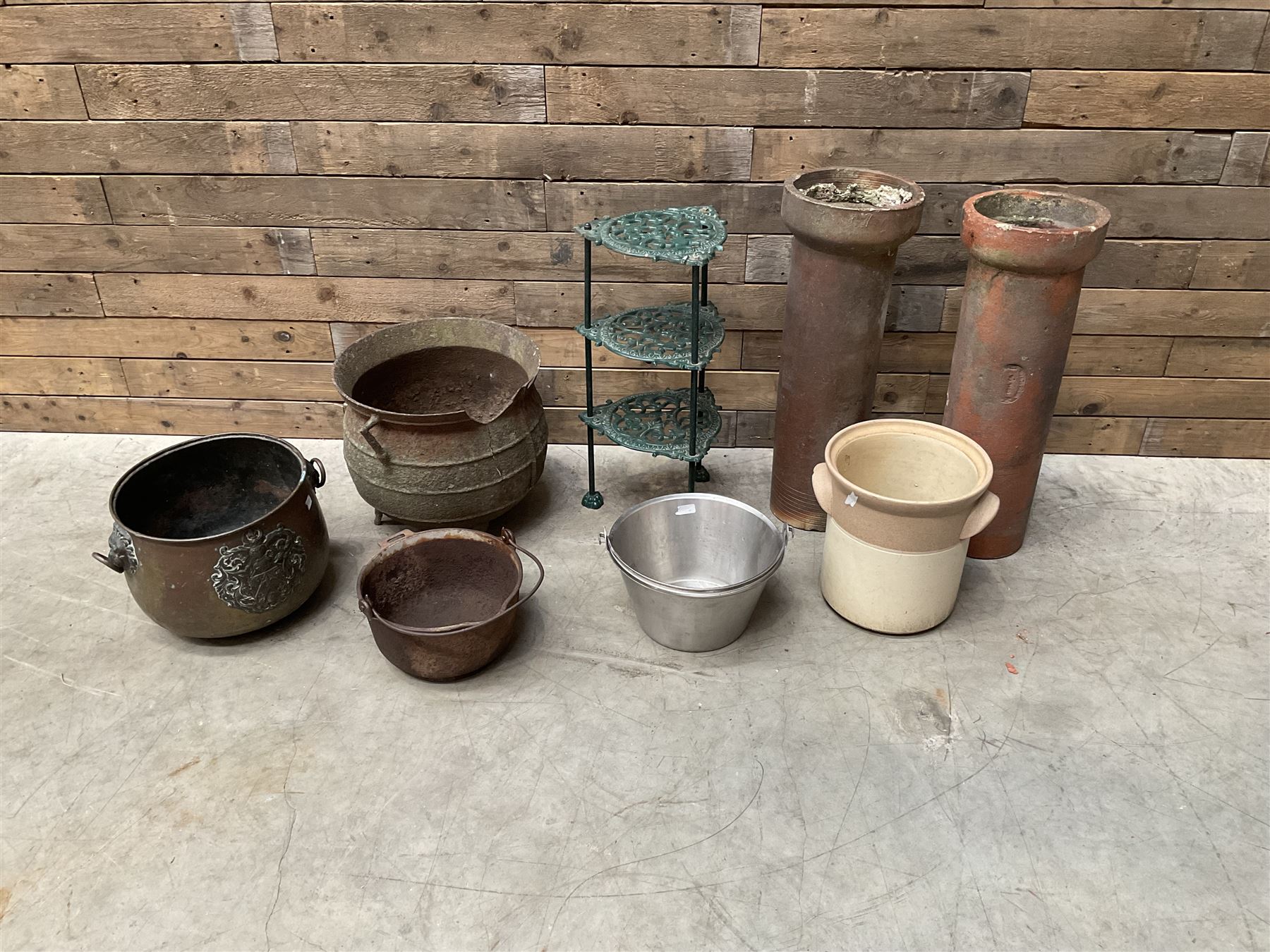 3 cauldron set pots with 2 terracotta chimney pots, 1 terracotta crock, metal bucket and small cast iron shelf 