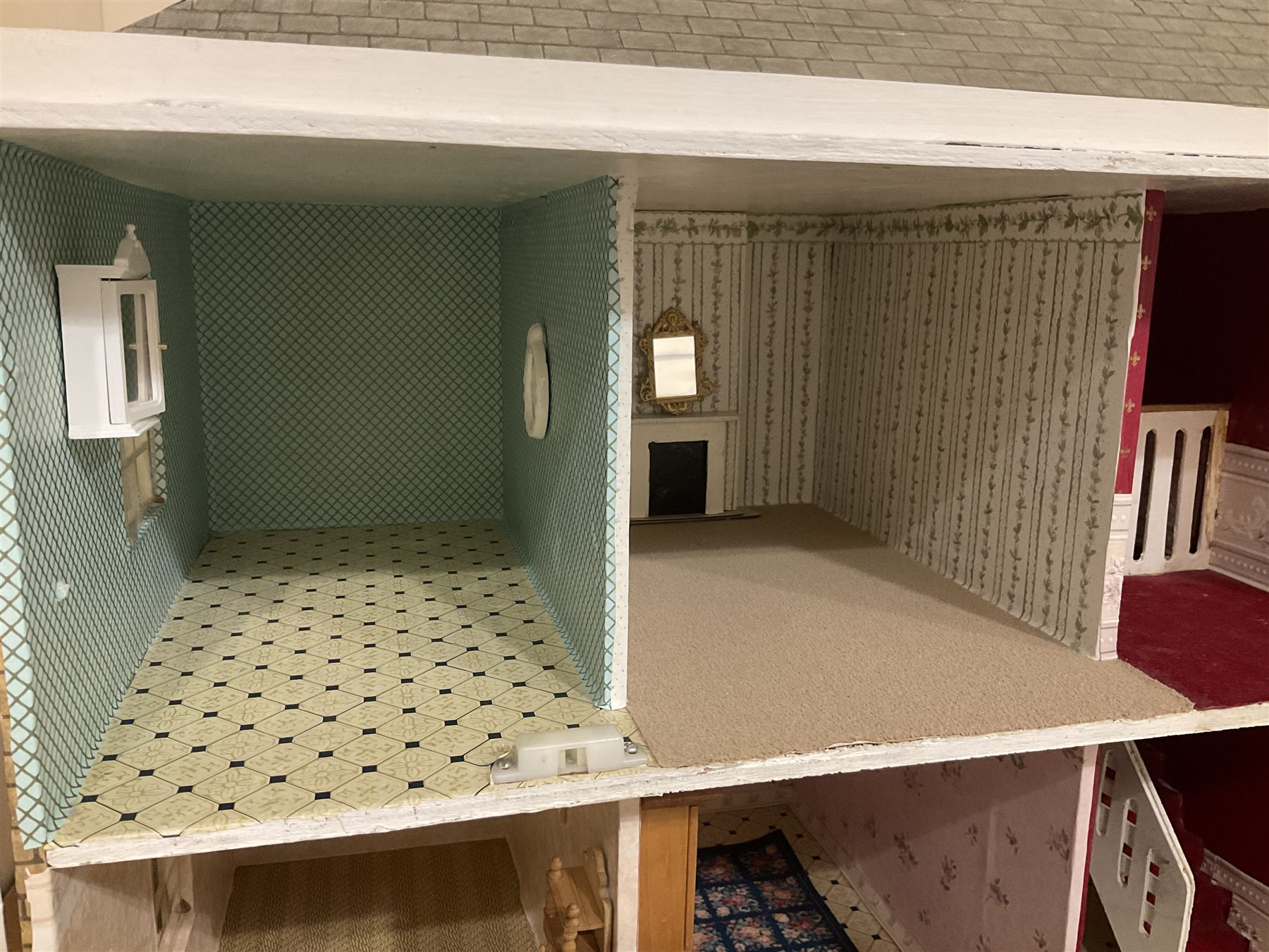 Modern scratch-built Palladian style wooden dolls  house as a 19th century double fronted two-storey property with simulated brick and stone walls under a removable simulated slate hipped roof; the triple hinged front elevation opening to reveal six rooms with central hall, stairs and landing L94cm H56cm D40cm