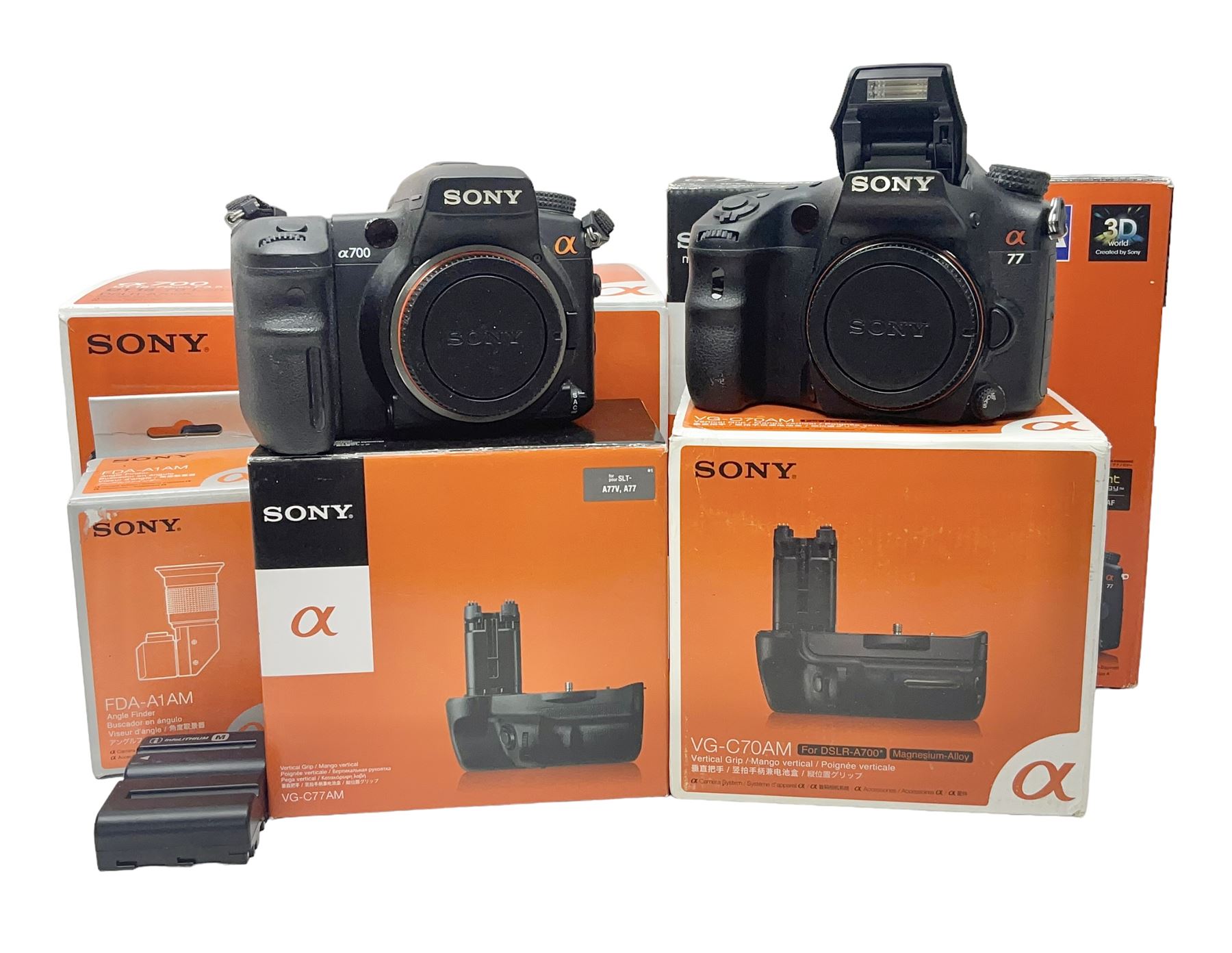 Sony Alpha A700 camera body, serial no 2340937, Sony Alpha A77 camera body, serial no 0715406, together with Sony angle finder and two firm holding grips, all with original boxes  