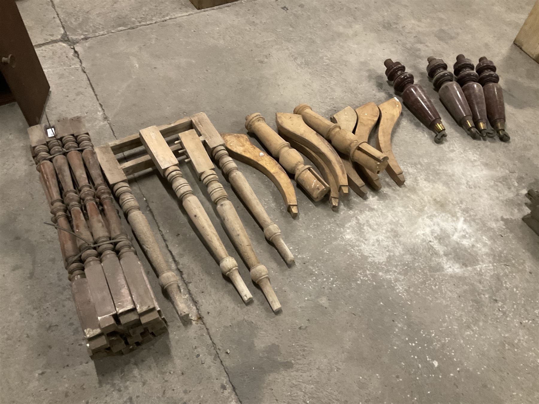 Set of four turned mahogany supports with brass cups and castors (H51cm); collection of splayed supports and turned supports; pine table and and two supports; and fifteen turned pine staircase spindles (H84cm) - THIS LOT IS TO BE COLLECTED BY APPOINTMENT FROM THE OLD BUFFER DEPOT, MELBOURNE PLACE, SOWERBY, THIRSK, YO7 1QY