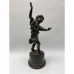 After E Plat, bronze modelled as a dancing child, signed E. Plat, upon cylindrical black marble base, H40cm