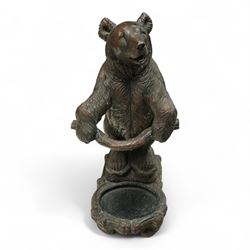 Early 20th century Black forest bear design stick stand, composite wood model of a bear with arms outstretched holding a branch forming the stick stand above a drip tray on tree branch form feet 