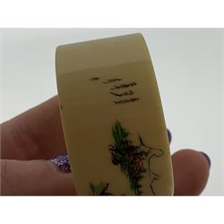 Set of six early 20th century Chinese ivory napkin rings decorated with figural scenes and calligraphy