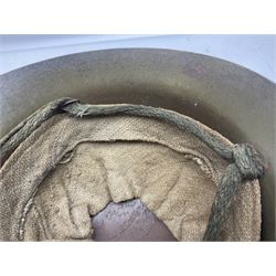 WW2 Japanese Army type 92 steel helmet with infantry star badge to centre, webbing liner and chin strap