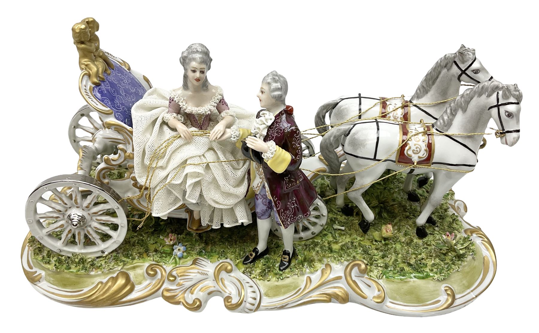 Capodimonte figure group of a horse drawn carriage with two horses pulling an open carriage with a male with dresden lace cuff and a female with full dresden lace skirt,  on a naturalistic base, H15.5cm