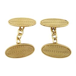 Pair of early 20th century 9ct gold oval engine turned decoration cufflinks, Birmingham 1926