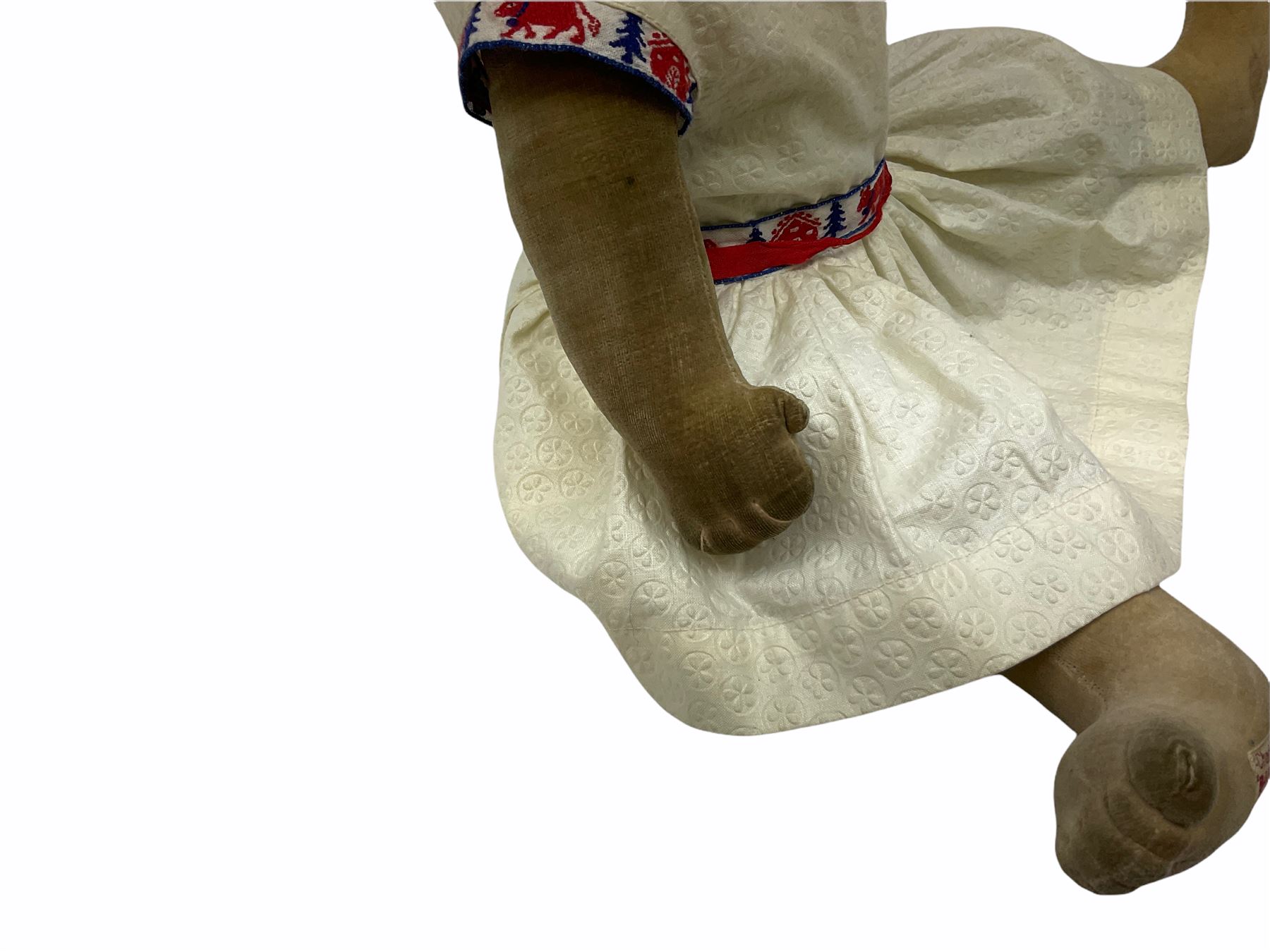 1920s Chad Valley 'Bambina' doll, the pressed felt head with applied hair, side glancing inset glass eyes, painted facial features and velvet jointed body, Hygenic and Bambina labels to the feet H46cm