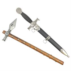 Reproduction WW2 German officer's dagger in scabbard; and reproduction native American Indian tomahawk/peace pipe with studded shaft (2)