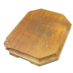 Mouseman - oak chopping board, of canted octagonal form with concave handles, with carved mouse signature, by the workshop of Robert Thompson of Kilburn