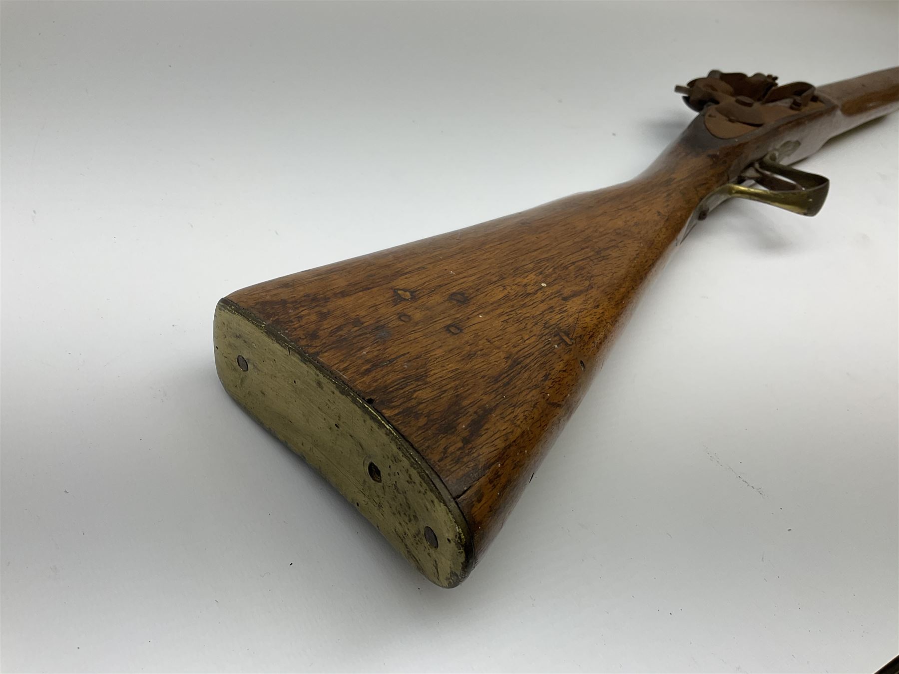 19th century flintlock musket for restoration or display, the mahogany full stock with brass mounts and under barrel ramrod L166.5cm
