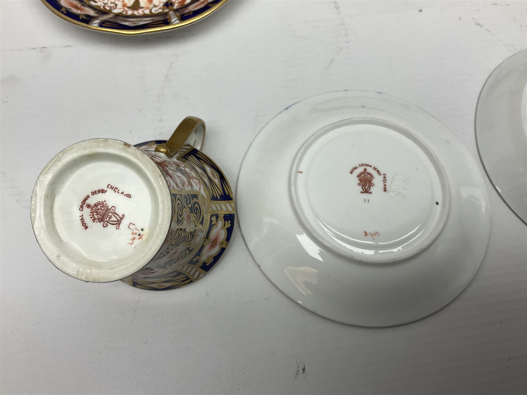 Six Royal Crown Derby cups and saucers all in imari pattern 2451, in various shapes  