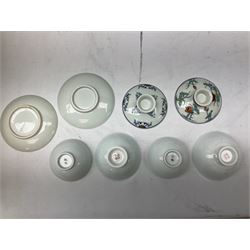 Two Chinese Yixing teapots, Chinese tea bowl hand painted with figures reading, another tea bowl with with underglaze floral panel and another tea bowl with saucer and lid, together with other teacups etc all boxed and with character marks