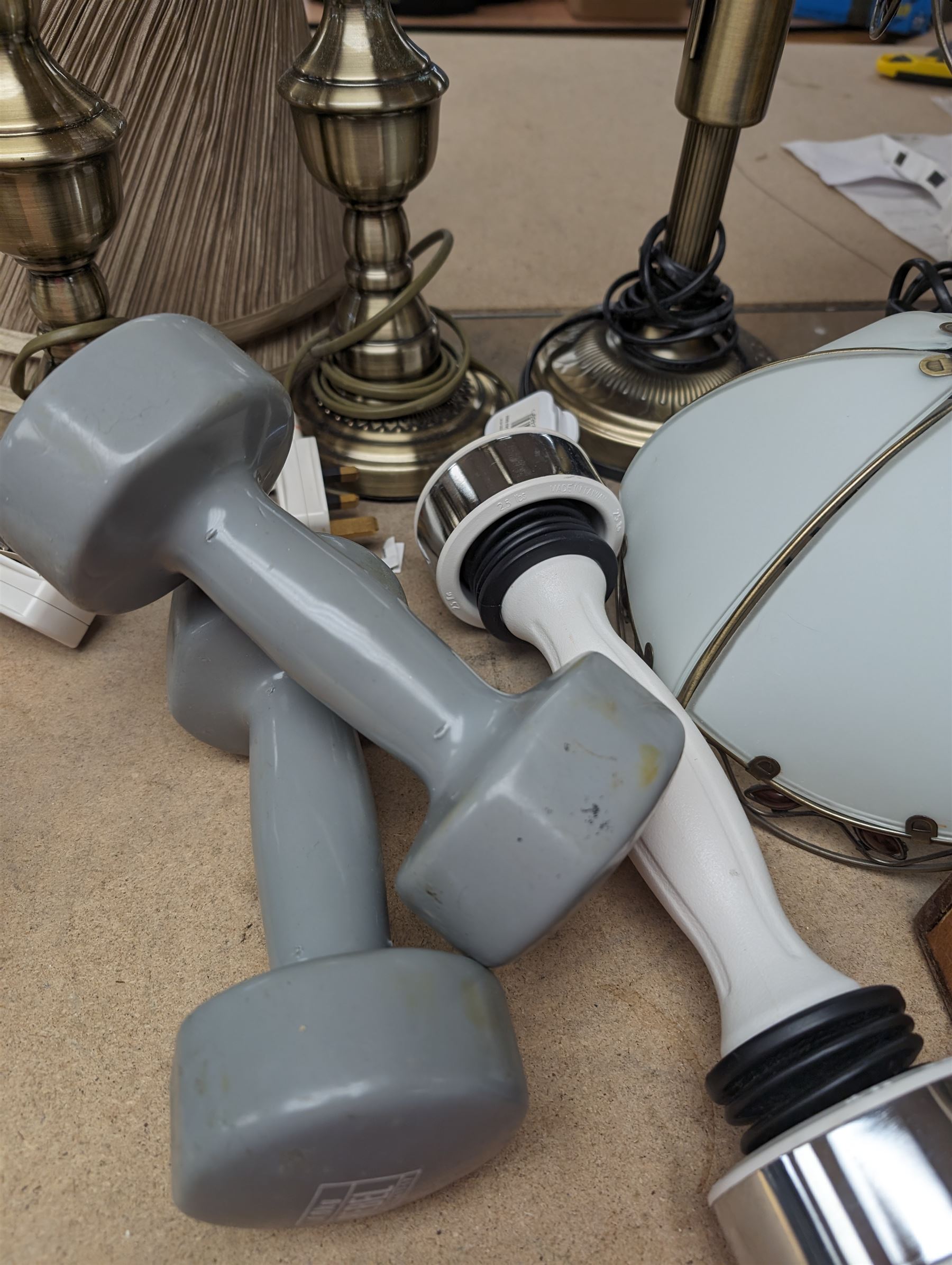Two pairs of table lamp bases, with two glass shades and two fabric shades, together with a wooden 'Hogwarts' box and dumbbells