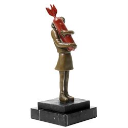 After Banksy - 'Bomb Love', bronze figure of a girl holding bomb, bearing signature, on marble base, overall H32.5cm